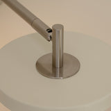 UMAGE_lifestyle_Asteria_wall lamp_short_hardwired_nuance mist_steel_(1).jpeg