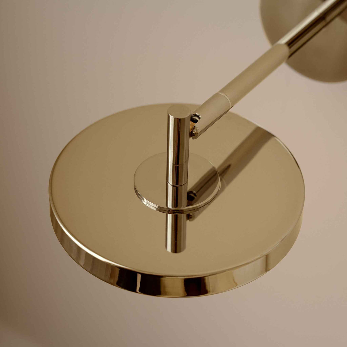 UMAGE_lifestyle_Asteria_wall lamp_short_polished brass_(3).jpeg